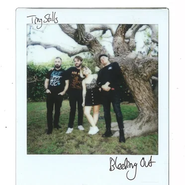 Bleeding Out by Tiny Stills - album cover
