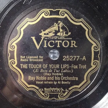 The Touch of Your Lips / Yours Truly Is Truly Yours