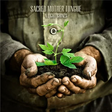 A Light Shines by Sacred Mother Tongue - album cover