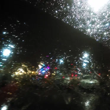 Driving on the Freeway at Night in a Storm (Cellphone Fields)